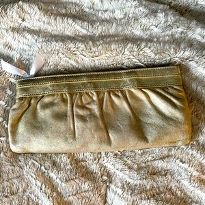 Metallic Clutch has both tints of silver and gold too it.